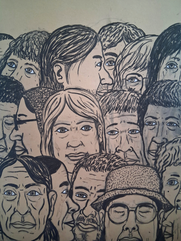 A charcoal drawing of a crowd of faces.